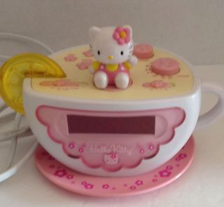 Hello Kitty Digital Am FM Tea Cup Alarm Clock Radio with Night Light