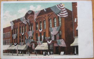 1909 Postcard US Flags on Maxwell Block Dansville NY