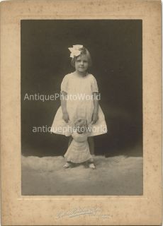 Beautiful Girl Posing with Toy Doll Antique Cabinet Photo