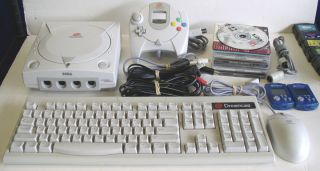  DREAMCAST CONSOLE SYSTEM w/ ALL HOOK UPS, MOUSE, KEYBOARD + 4 GAMES
