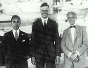 Lindbergh with Edsel Ford (left) and Henry Ford in the Ford hangar