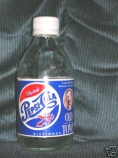 Two Empty Bottles Promotional 25 Cent Pepsi from Old Town Kissimmee FL