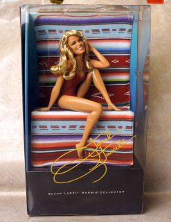 you are bidding on a farrah fawcett barbie doll this doll only sits on