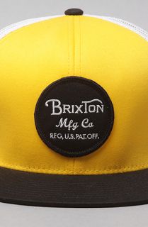 Brixton The Wheeler Trucker Hat in Yellow Black
