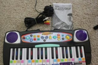  auction is a used Fisher Price I Can Play Electronic Piano / Keyboard