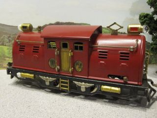 Lionel No. 254 Electric Locomotive CMStP&P 0 4 0 Red/Black/Brass   Ca