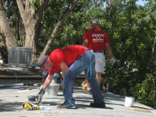 our volunteers repairing a roof in north fort collins