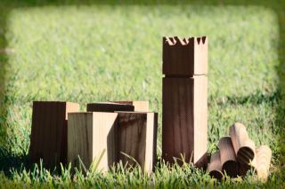 Play some Kubb, the outdoor viking game of strategy and fun.