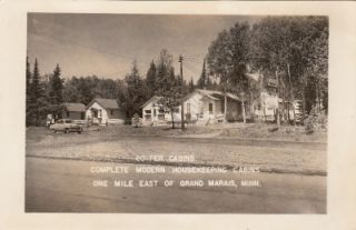 3434 Vintage RPPC Postcard 1950s Grand Marais, Minnesota Go Fer Cabins