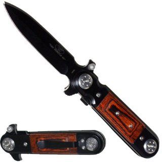 A P 107 BPK. 9 Rosewood Tiger USA Dagger Style Action