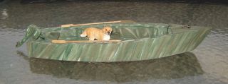 Camo Painted Duck Boat with Dog