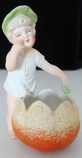 ADORABLE BISQUE CHILD FIGURINE WITH A SPOON & FRUIT BOWL