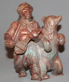HAND MADE GLAZED REDWARE POTTERY FIGURINE REBEC PLAYER AND BEAR