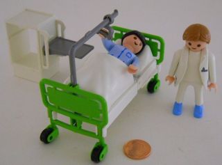 Hospital Lot Hospital Bed with Child Patient Doctor End Table