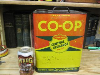 CO OP CENTERAL EXCHANGE FARMERS MOTOR OIL 2 GALLON TIN CAN FILLING