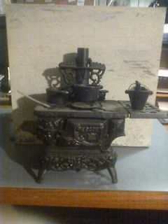 VINTAGE CAST IRON CRESCENT TOY COOK STOVE WITH ACCESSORIES