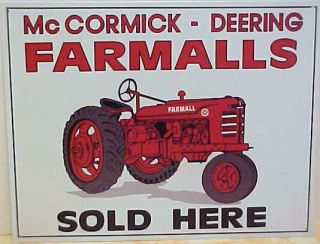 MC CORMICK DEERING FARMALLS SOLD HERE, METAL SIGN