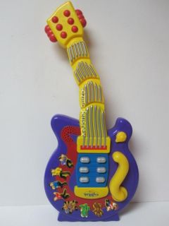 Wiggles Singing Musical Dancing Purple Wiggly Toy Guitar by Spinmaster