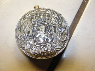 Round slide open lighter, ornate double sided decoration, silvertone