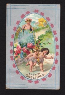 Easter Greetings Postcard Cherubs Pulling Star Decorated Egg Roses