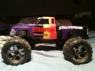  STAMPEDE radio controlled truck with extra set of wheels and tires