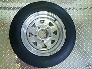 This is a LoadStar 12 6Ply Galvanized Tire/Wheel Combo with 5 x 4.5