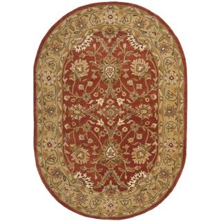 Handmade Kerman Rust/ Gold Wool Rug (46 X 66 Oval)