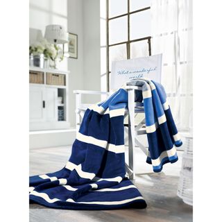 Sorrento Coast Stripe Oversize Throw (Blue/whiteMaterials 60 percent cotton/33 percent acrylic/7 percent polyesterCare instructions Machine washableDimensions 60 inches wide x 80 inches highThe digital images we display have the most accurate color pos