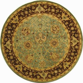 Handmade Traditions Teal/ Brown Wool Rug (6 Round) (GreenPattern OrientalMeasures 0.625 inch thickTip We recommend the use of a non skid pad to keep the rug in place on smooth surfaces.All rug sizes are approximate. Due to the difference of monitor colo