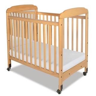 Serenity Natural Mirrored End Fixed side Compact Crib With Mattress (NaturalMaterials Selected hardwoodsFinish NaturalSafety features Meets all applicable mandatory and voluntary standards published by the CPSC, ASTM and JPMA which includes 16CFR 1220 