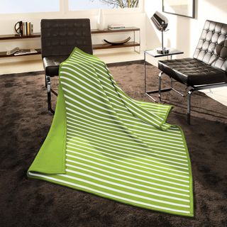Angelohome Woven Stripe Parrot Throw (Green, ivoryMaterials 86 percent acrylic, 7 percent cotton, 7 percent polyesterCare instructions Machine wash, tumble dry Dimensions 55 inches wide x 70 inches long 100 percent made in GermanyThe digital images we