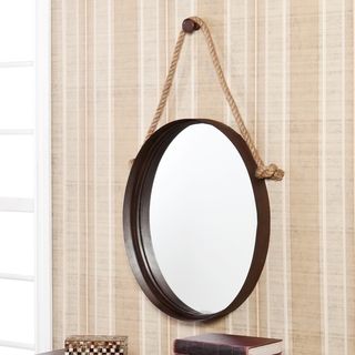 Upton Home Winslow Decorative Wall Mirror (RustRope accent adds to the captains mirror lookNo assembly requiredKnob mounts to wall separately to allow for adjustable slack in ropeAged metal look adds simple, vintage styleMirror oval surface 25 inches hig