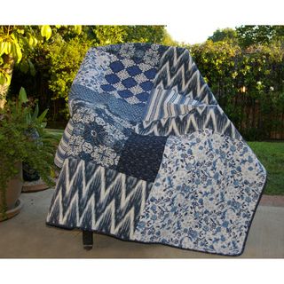 Santorini Quilted Throw (Multi Shell 100 percent cotton Fill 100 percent cotton Pre washed and pre shrunkCare instructions Machine wash coldDimensions 50 inches wide x 60 inches longThe digital images we display have the most accurate color possible. 