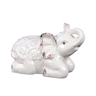 White Ceramic Elephant (WhiteDimensions 7.5 inches high x 11 inches wide x 5.5 inches deep CeramicColor WhiteDimensions 7.5 inches high x 11 inches wide x 5.5 inches deep)