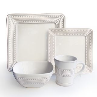 Bianca White Square With Dots 16 piece Dinnerware Set (WhitePieces 16 Service for Four (4)Style Casual dinnerwareMaterial EarthenwareMicrowave safe YesOven safe No Care instructions Dishwasher safeSet Includes Four (4) dinner plates 10.75 inchesF