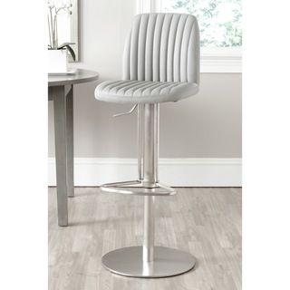 Safavieh Lamont Grey Barstool (GreyIncludes One (1) stoolMaterials Stainless steel and leather/ PUSeat dimensions 16.9 inches width and 15.35 inches depthSeat height 22.44 32 inchesDimensions 33.46 inches high x 19.29 inches wide x 17.32 inches deepW