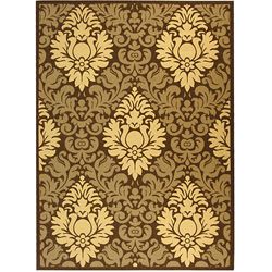 Indoor/ Outdoor Crescent Chocolate/ Natural Rug (710 X 11) (BrownPattern FloralMeasures 0.25 inch thickTip We recommend the use of a non skid pad to keep the rug in place on smooth surfaces.All rug sizes are approximate. Due to the difference of monitor