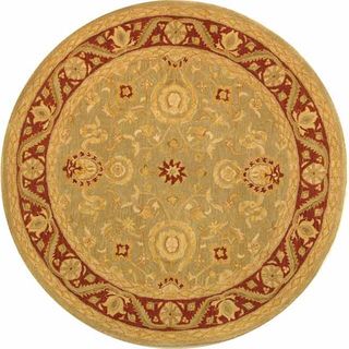 Handmade Kashan Green/ Red Wool Rug (4 Round) (GreenPattern OrientalMeasures 0.625 inch thickTip We recommend the use of a non skid pad to keep the rug in place on smooth surfaces.All rug sizes are approximate. Due to the difference of monitor colors, s
