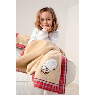 Solare Kids Cuddle Sheep Blanket (NaturalMaterials 60 percent cotton/ 33 percent acrylic/ 7 percent polyesterCertified by Oeko Tex standard 100Care instructions Machine washableDimensions 40 inches wide x 60 inches long The digital images we display ha