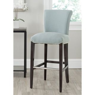 Safavieh Seth Blue Bar Stool (30 Inche) (Sky Blue Includes One (1) stoolMaterials Iron, birch wood and polyester blend fabricFinish EspressoSeat dimensions 18.7 inches width and 16.6 inches depthSeat height 29.3 inchesDimensions 43.5 inches high x 1